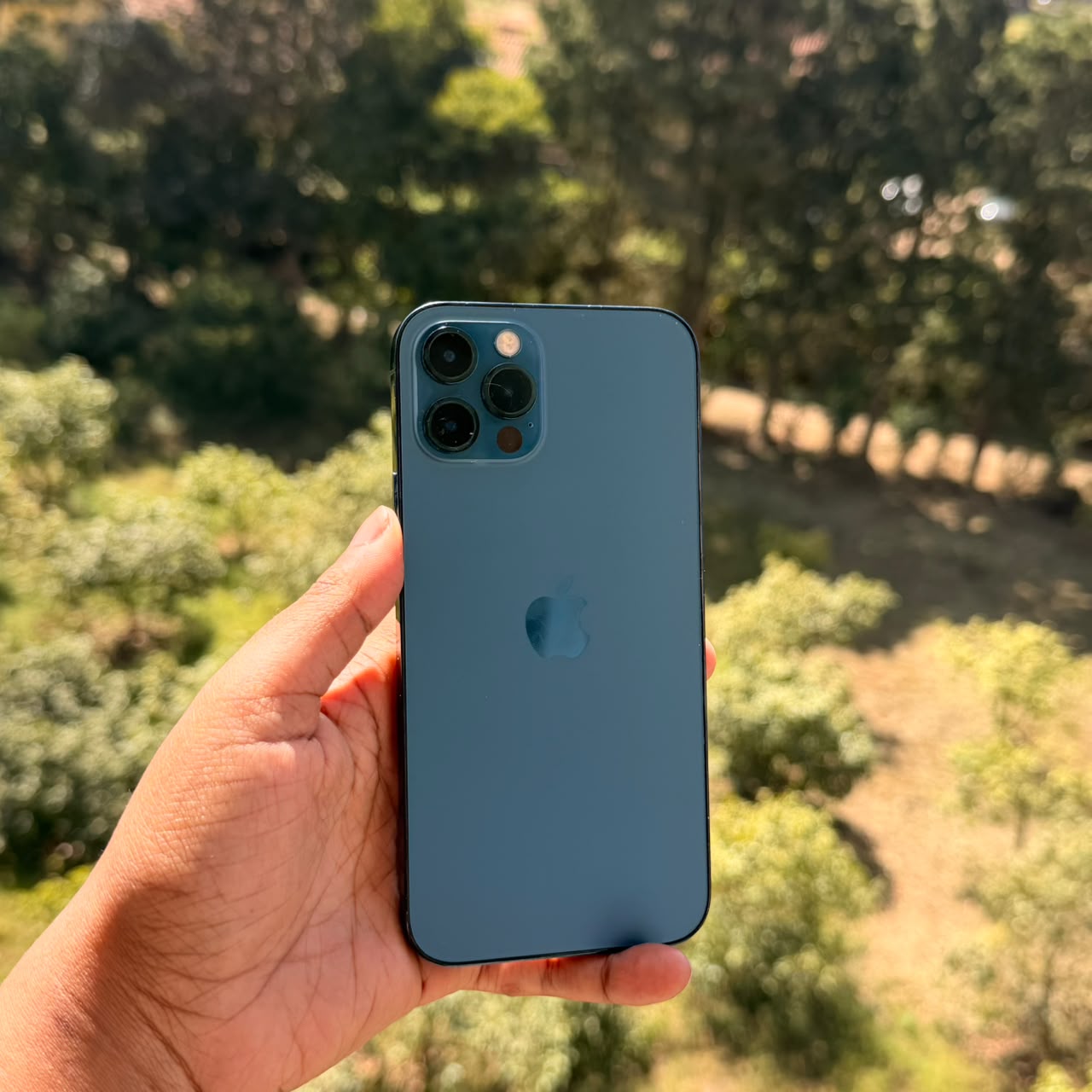 Used iPhone 12 Pro in Pacific Blue with a genuine replacement battery, iTey Store Kenya